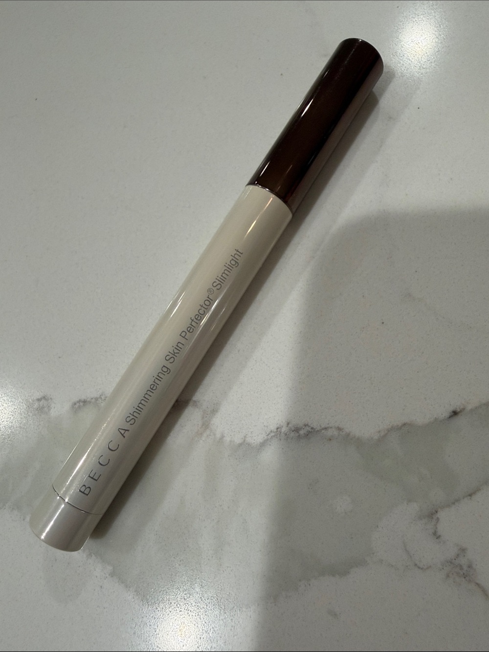 BECCA Slimlight Shimmering Skin Perfector in Pearl